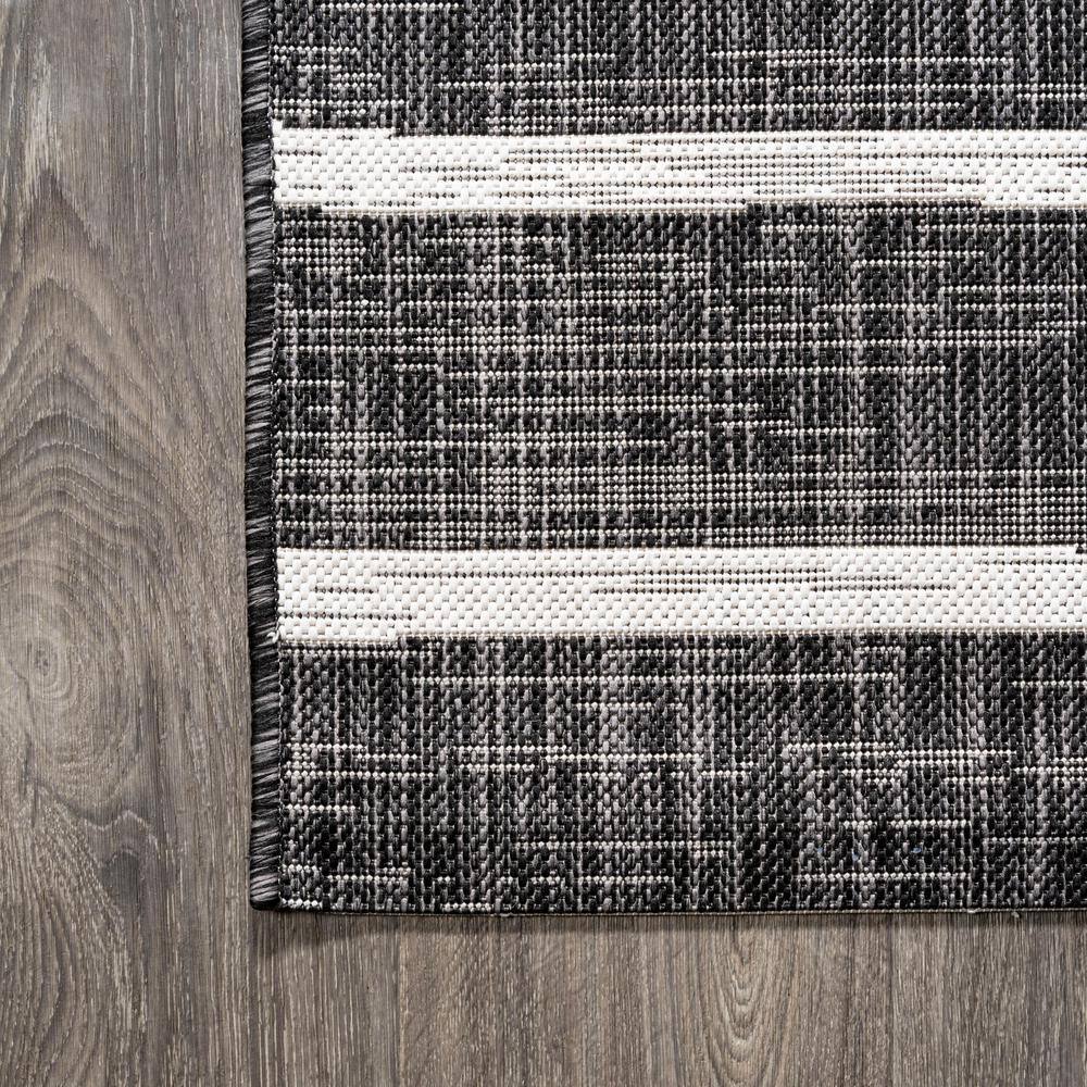 3' x 5' Black and Ivory Synthetic Stripe Rectangular Rug