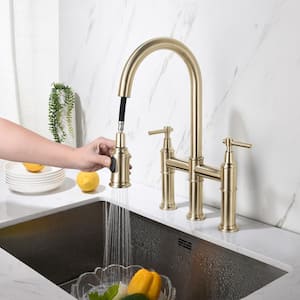 Double Handle Bridge Kitchen Faucet with Pull-Down Spray Head in Spot in Brushed Gold