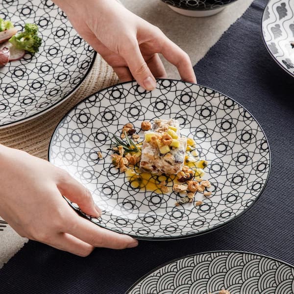 https://images.thdstatic.com/productImages/bb276db7-f6ed-42df-9b3a-232cd746b71d/svn/gray-patterned-porcelain-vancasso-dinnerware-sets-vc-haruka-sl-44_600.jpg