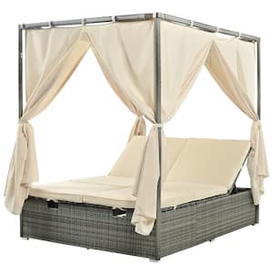 Gray Wicker Outdoor Day Bed with Beige Cushions and Beige Curtains and Adjustable Backrest