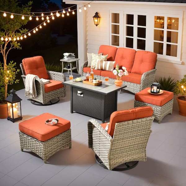 Gerbera C 7-Piece Wicker Patio 42 in. Fire Pit Conversation Set with Swivel Rocking Chairs and Orange Red Cushions