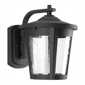 East Haven LED Collection 1-Light Textured Black Clear Seeded Glass Transitional Outdoor Medium Wall Lantern Light