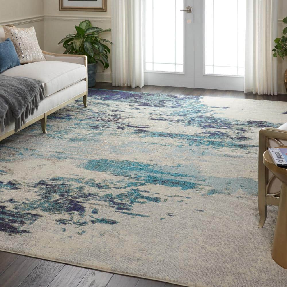 Celestial Swirl 9' x 12' Ivory & Teal Blue Abstract Synthetic Rug