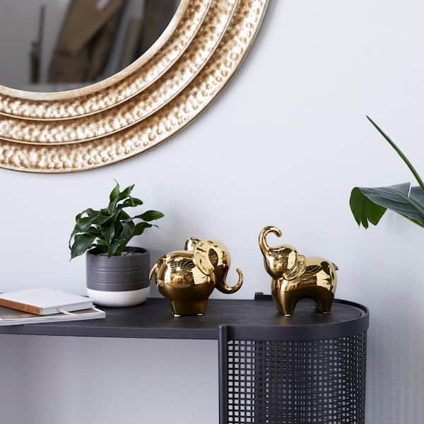 Litton Lane Gold Porcelain Elephant Sculpture (Set of 2)