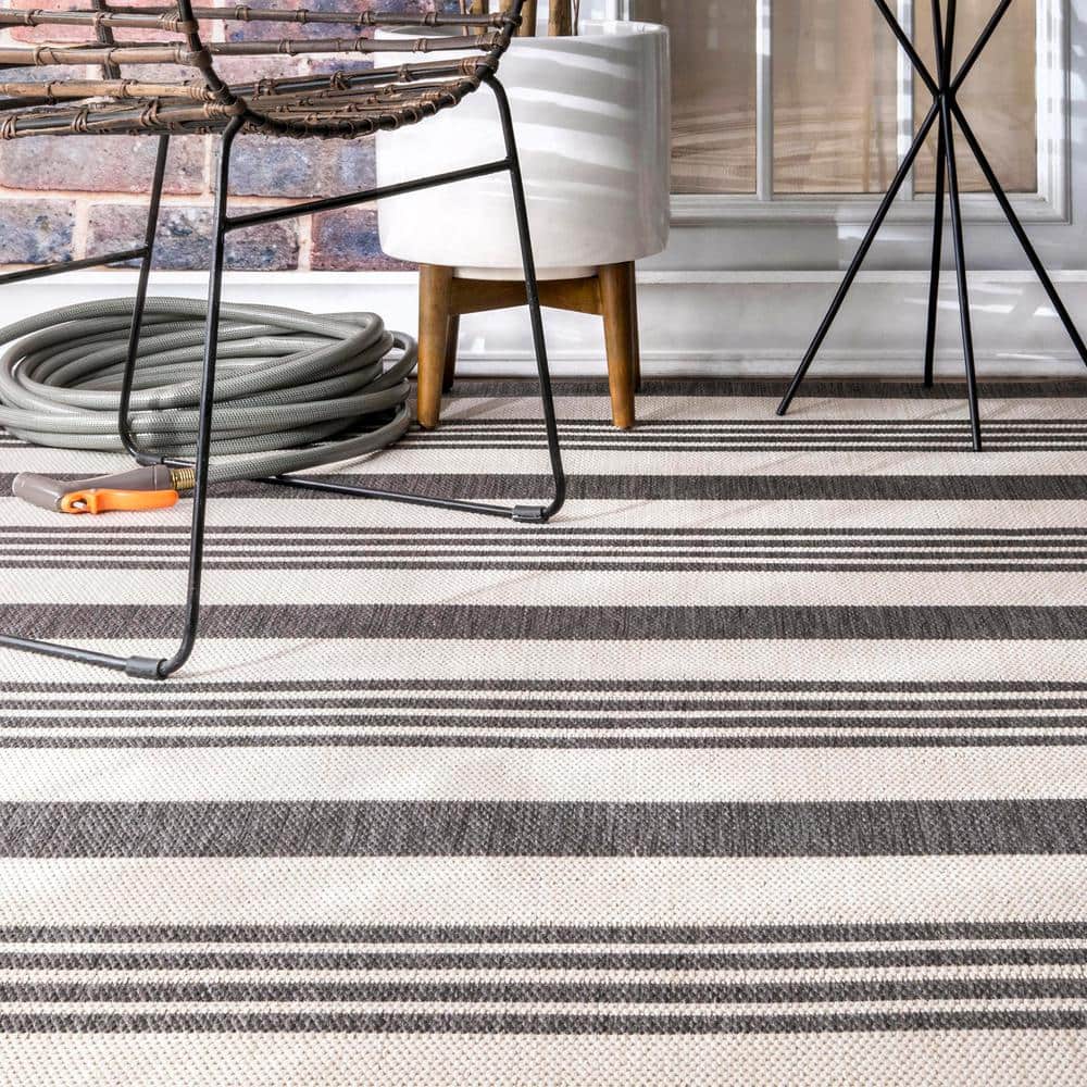 Beige and Brown 6' x 9' Stripe Synthetic Area Rug