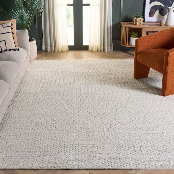 Revive 9 ft. x 12 ft. Ivory Textured Solid Color Area Rug