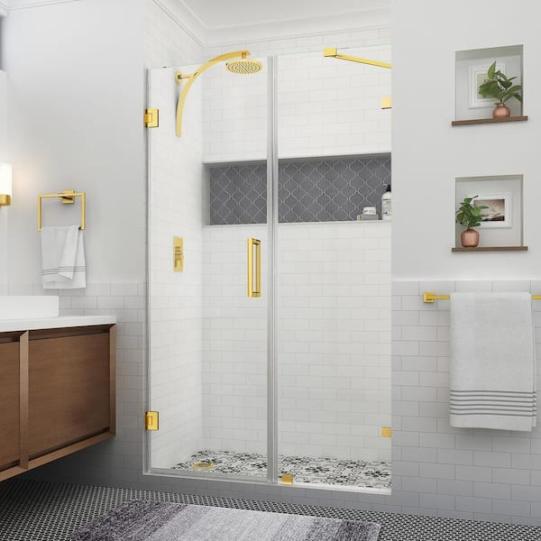 Aston Nautis XL 51.25 - 52.25 in. W x 80 in. H Hinged Frameless Shower Door in Brushed Gold with Clear StarCast Glass