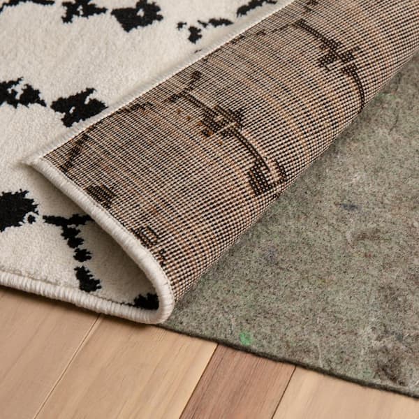 How to Keep Rugs From Sliding on Hardwood Floors and Other Surfaces