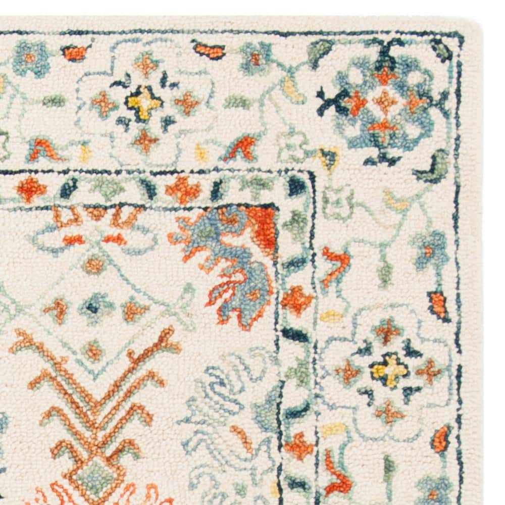 Handmade Rustic-Chic Blue Floral Wool Area Rug - 6' x 9'