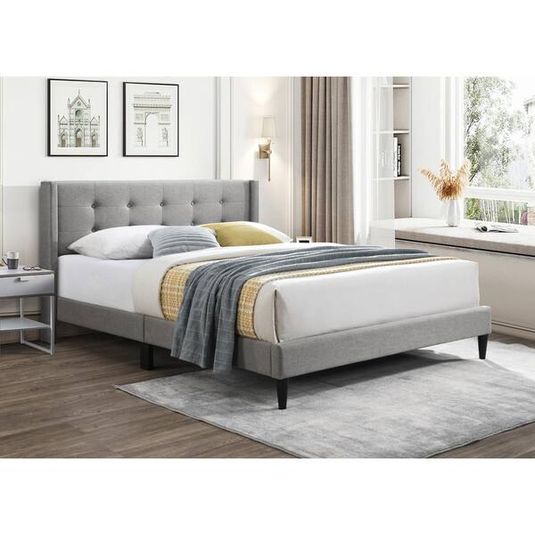 Grey upholstered wingback online bed