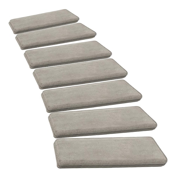 https://images.thdstatic.com/productImages/bbc45887-3098-49d3-97bf-64a8918c1840/svn/cream-gray-pure-era-stair-tread-covers-pe-st08-cgr14-77_600.jpg