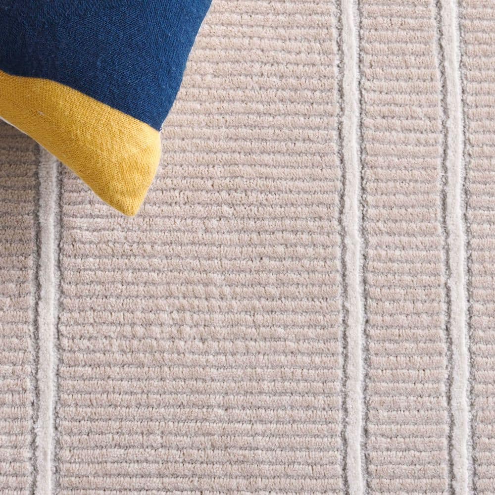 Beige and Grey Geometric 9' x 12' Synthetic Area Rug