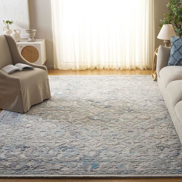 Marquee 9 ft. x 12 ft. Light Blue/Beige Abstract Border Area Rug