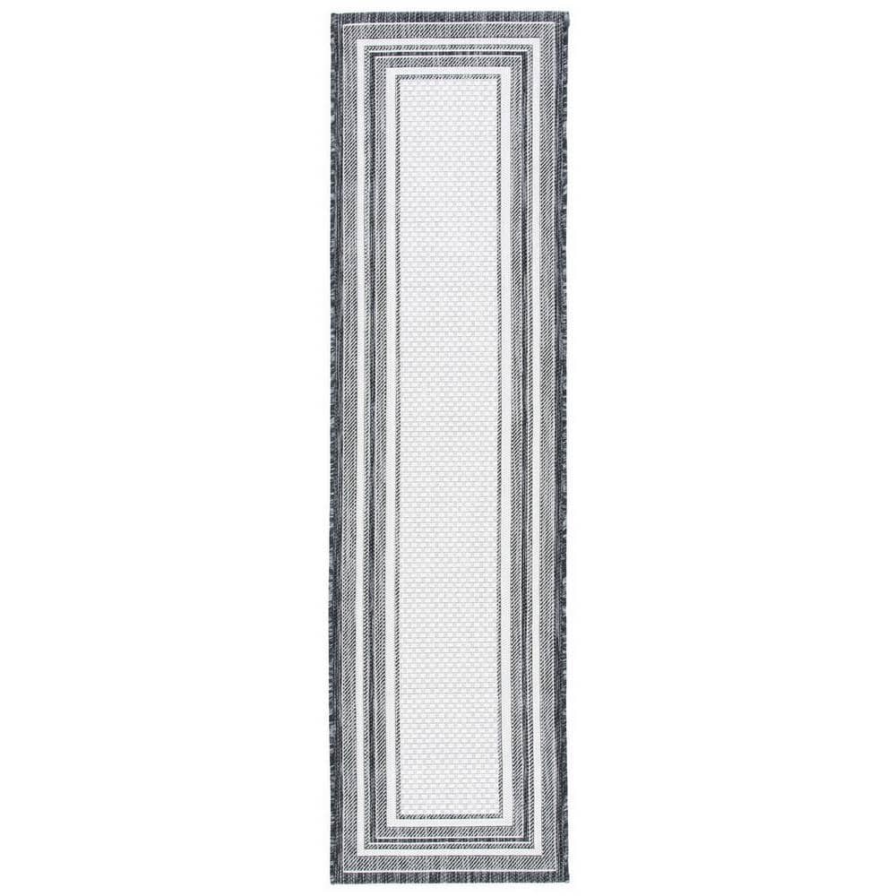 Courtyard Ivory/Black 2 ft. x 7 ft. Solid Color Striped Indoor/Outdoor Runner Rug price history on PriceWatchPro