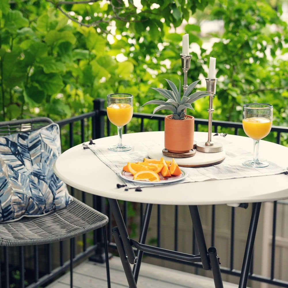 Almond HDPE 33" Round Bistro Table with Bronze Steel Legs