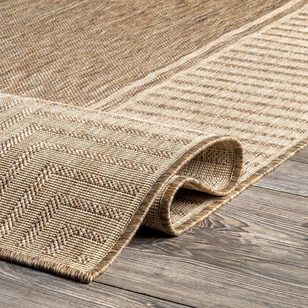 https://images.thdstatic.com/productImages/bbfa5390-8ec1-43ed-b583-7c521b41e9a0/svn/light-brown-nuloom-area-rugs-gbcb02b-r67067-44_600.jpg