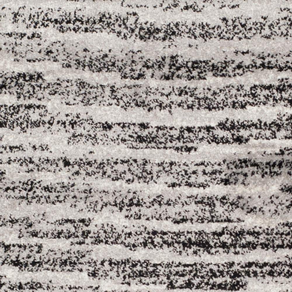 Reversible Black Stripe Synthetic 8' x 10' Rectangular Rug