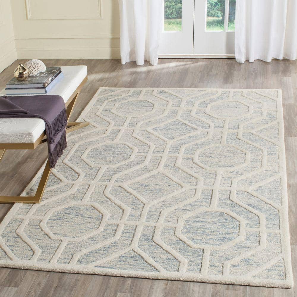 Handmade Tufted Blue and Ivory Wool Area Rug