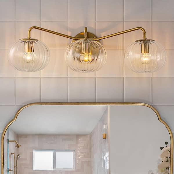 Lila 23.23 in. 3-Light Brass Bathroom Vanity Light with Clear Global Ribbed Glass Shades