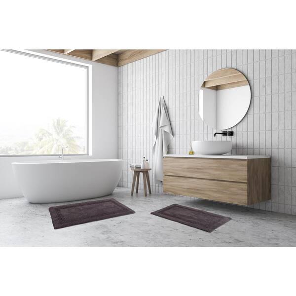 https://images.thdstatic.com/productImages/bc1a8e68-934a-5461-bf3d-8fed3292602a/svn/dark-grey-french-connection-bathroom-rugs-bath-mats-fcb014193-31_600.jpg