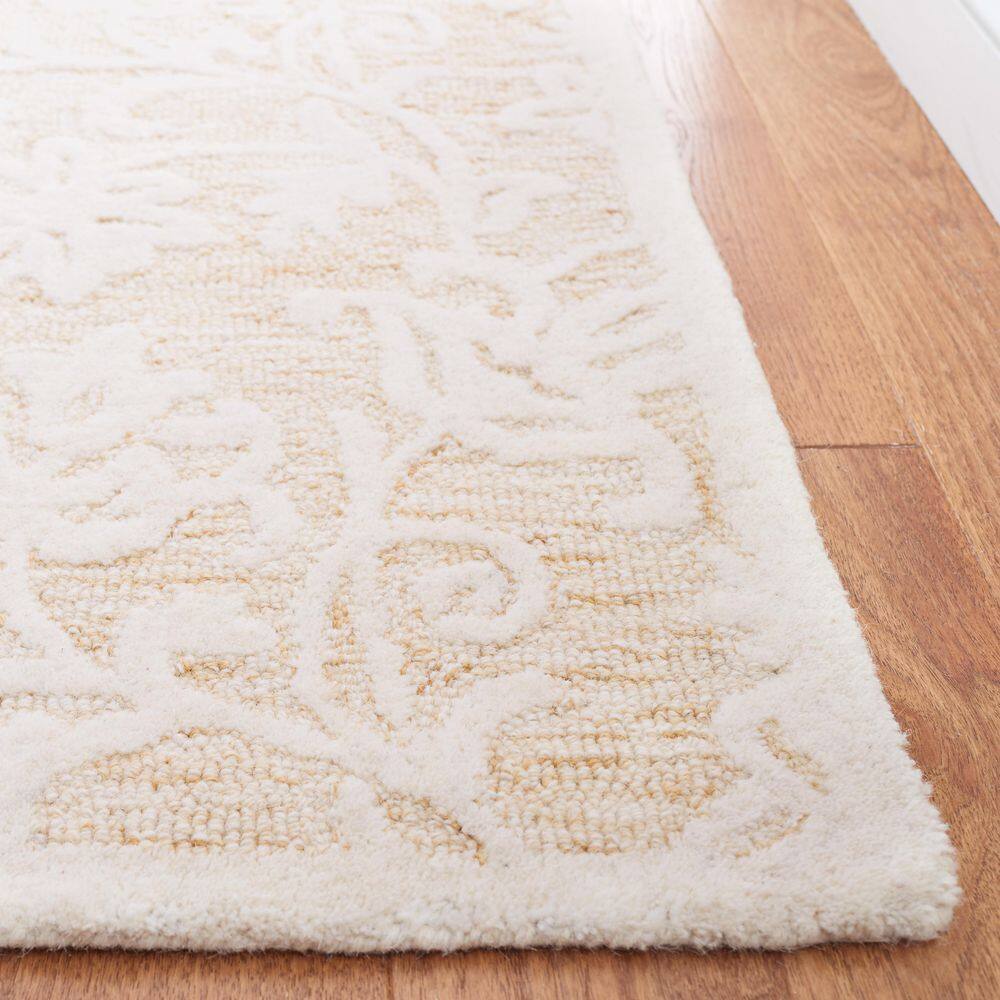 Handmade Ivory Floral Tufted Wool Area Rug 8' x 10'