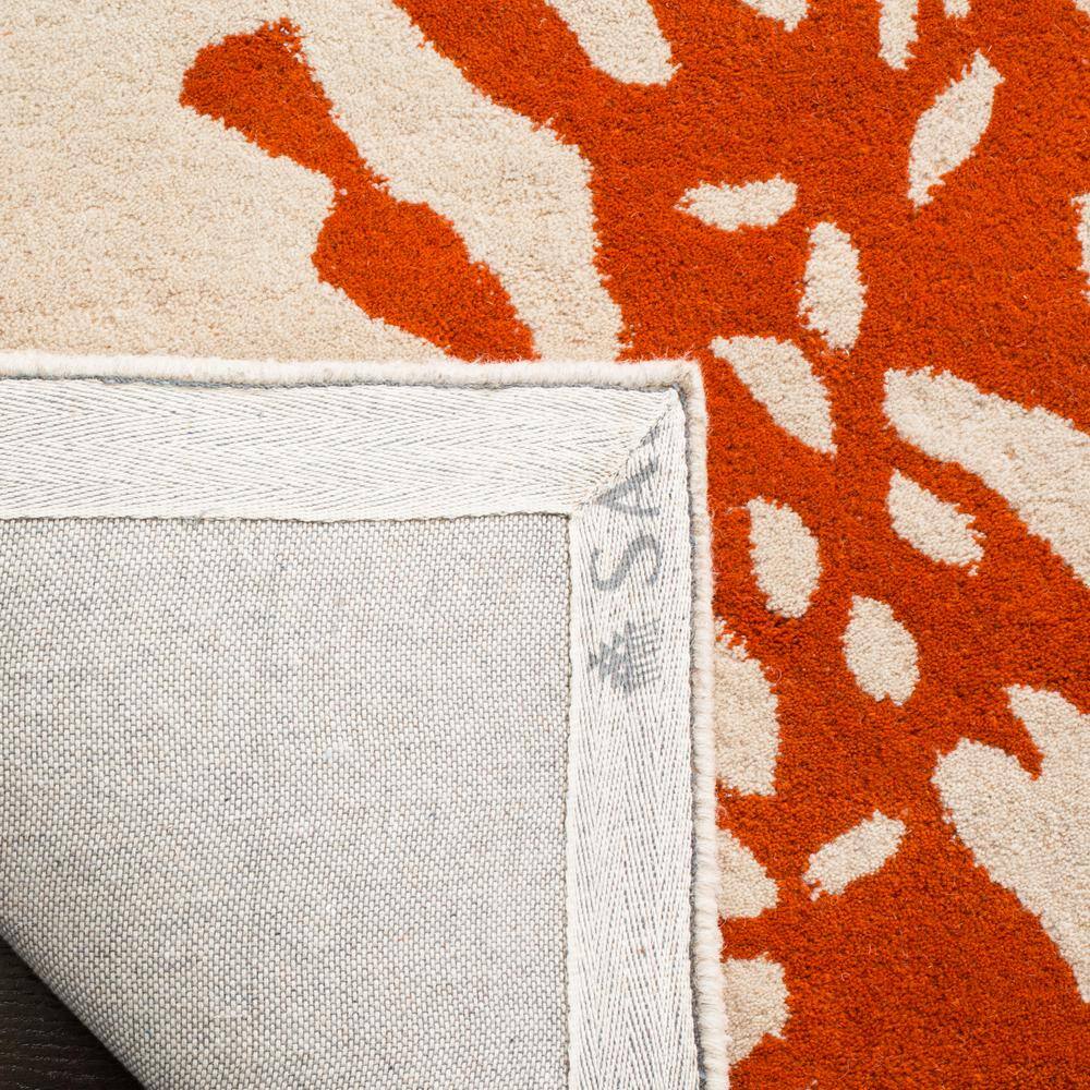 Hand-Tufted Bella Wool Area Rug 6' x 9' in Beige and Terracotta
