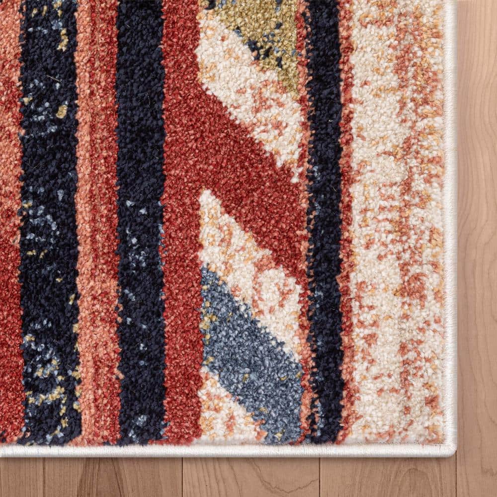 Cream and Multicolor 4' x 6' Southwestern Synthetic Area Rug