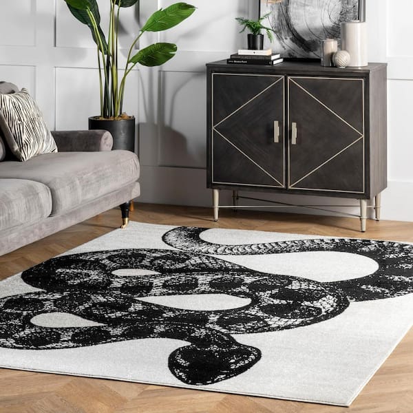 https://images.thdstatic.com/productImages/bc59e136-ae45-4b2b-983f-79313a39f027/svn/black-and-white-nuloom-area-rugs-bdtp04a-406-e1_600.jpg