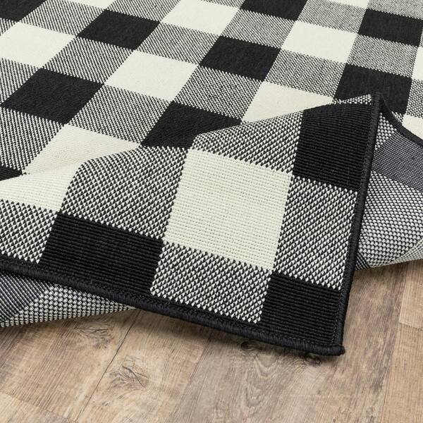 https://images.thdstatic.com/productImages/bc79fa6a-0152-4f15-bc25-ae298b361701/svn/black-averley-home-outdoor-rugs-821209-4f_600.jpg