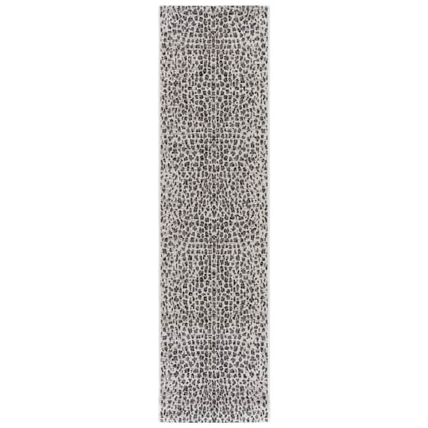 Courtyard 2 ft. x 8 ft. Ivory/Black Cheetah Geometric Indoor/Outdoor Runner Rug