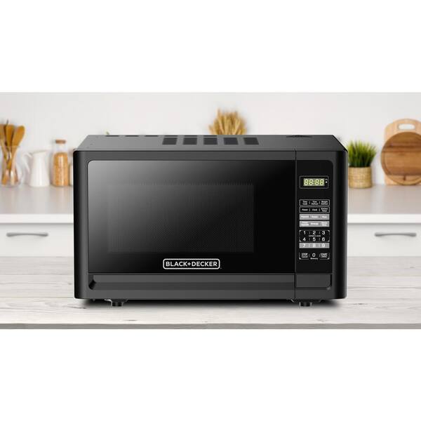 Magic Chef 0.7 cu. ft. 700-Watt Countertop Microwave in Black HMM770B2 -  The Home Depot