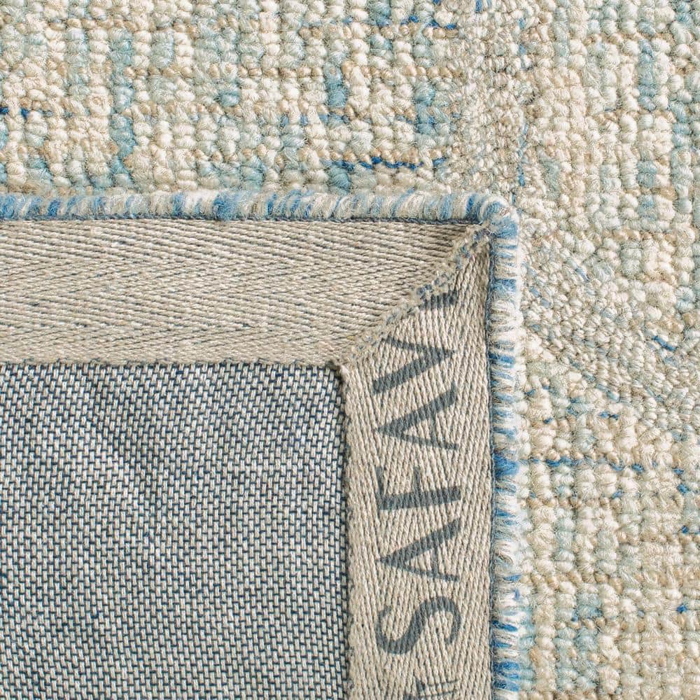 Ivory and Light Blue Handmade Wool Abstract Area Rug