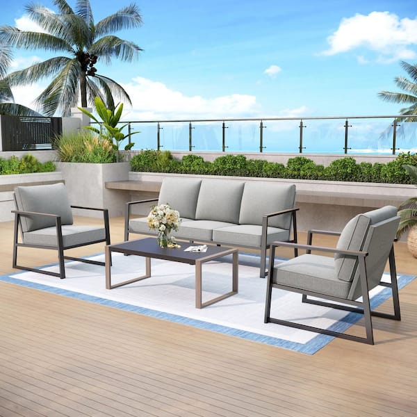 Modern Minimalist Line Design Sling Soft Mesh 4-Piece Metal Patio Conversation Set with Gray Cushions and Coffee Table