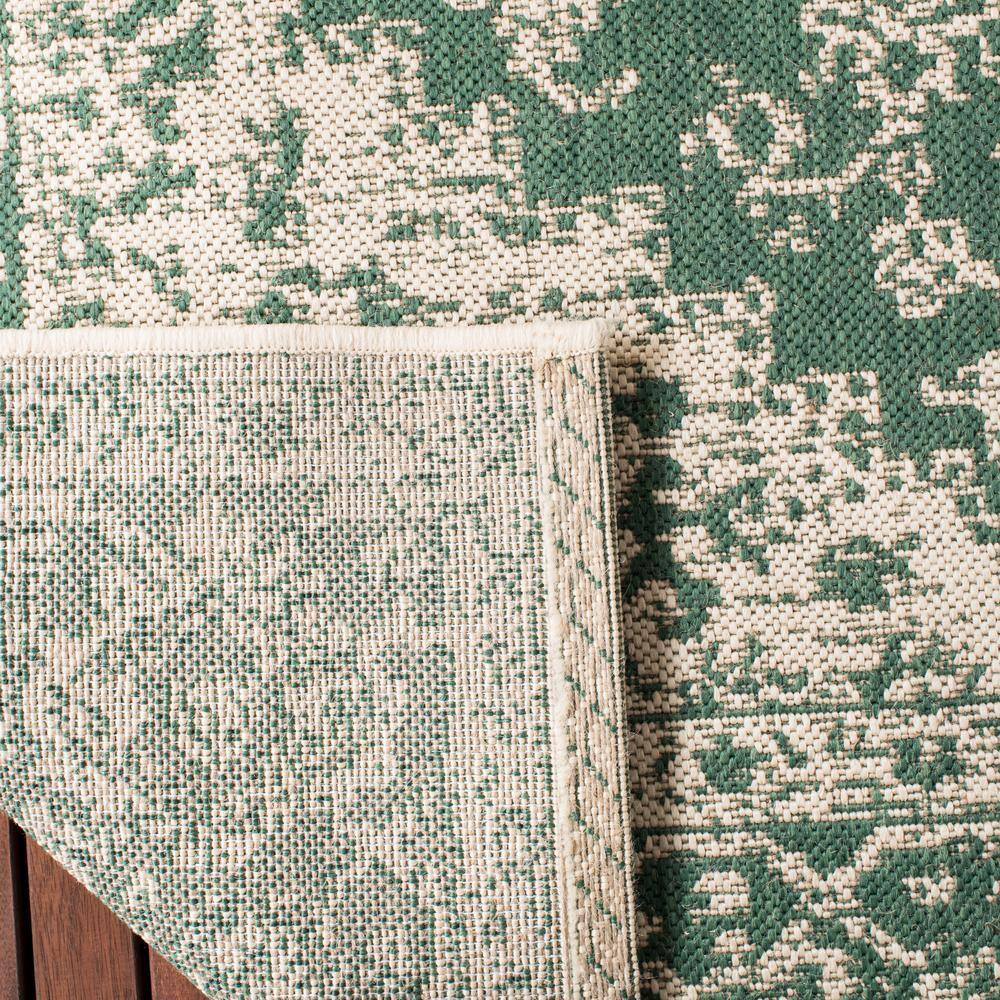 Green and Creme Medallion Synthetic 9' x 12' Tufted Area Rug
