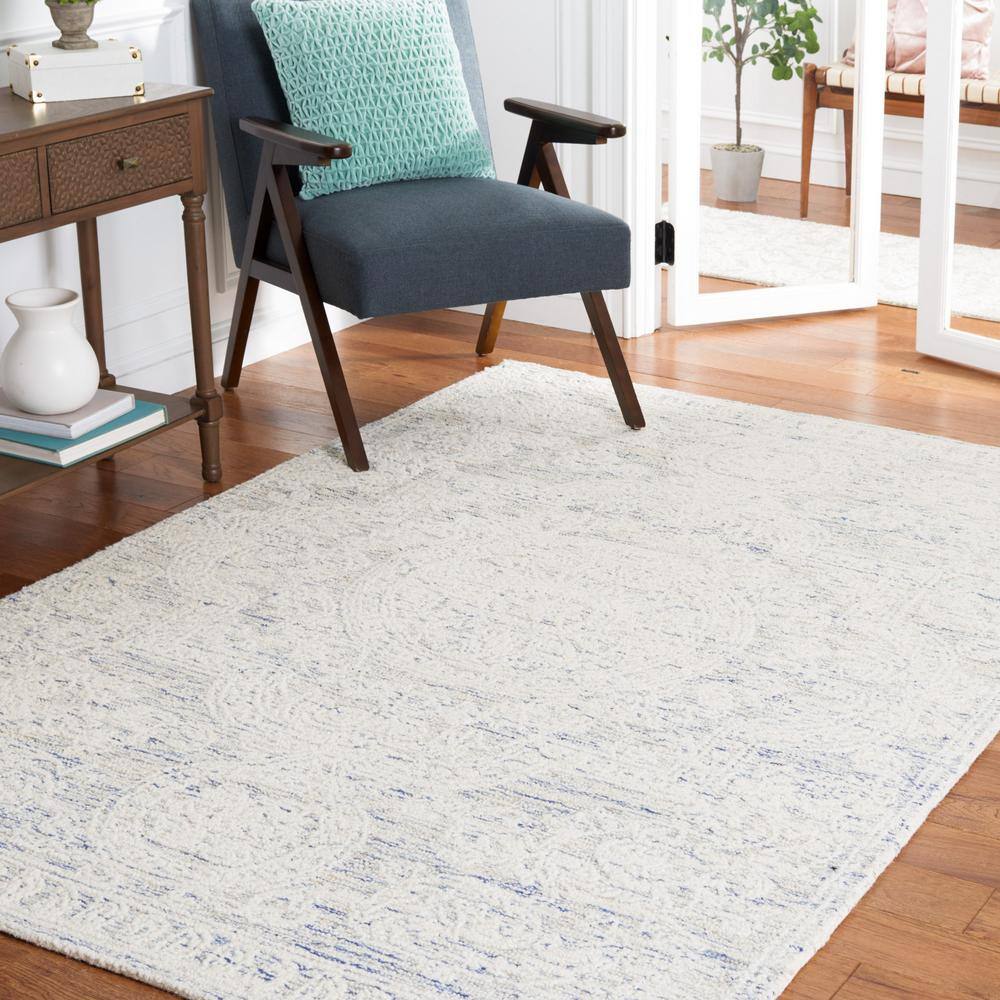 Ivory Round Handmade Tufted Wool Abstract Rug, 4' x 6'
