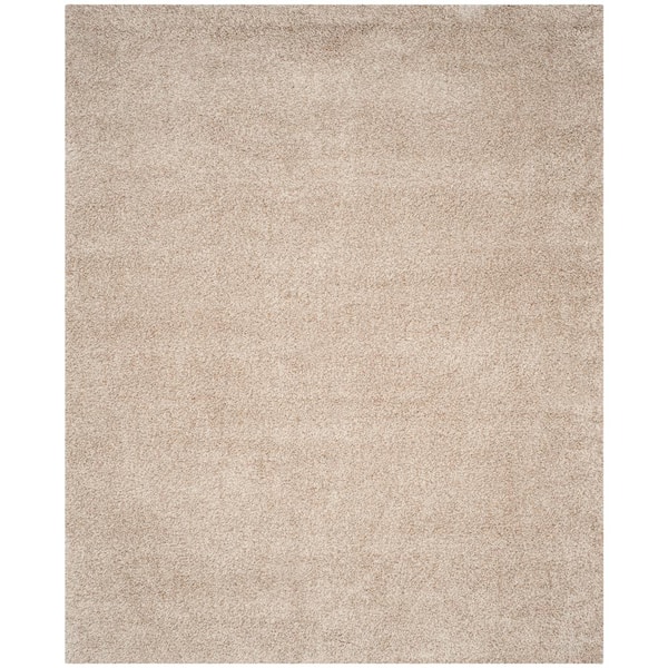 SAFAVIEH Santa Monica Shag Beige 7 ft. x 10 ft. Solid Area Rug