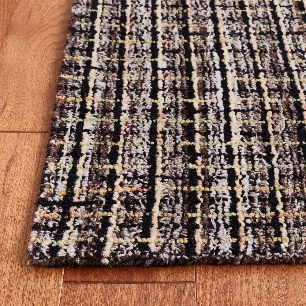 Black and Beige Abstract Handmade Wool 6' x 9' Tufted Rug