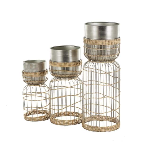 Litton Lane Silver Metal Textured Dome Planter with Woven Rattan and Caged Rod Pedestal Base, Set of 3 30 in. 23 in. 18 in. H