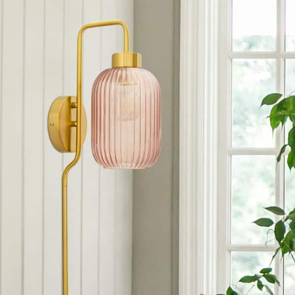 Harlow 8.625 in. Brushed Gold-Colored Wall Sconce with Pink Globe-Shaped Glass Shade