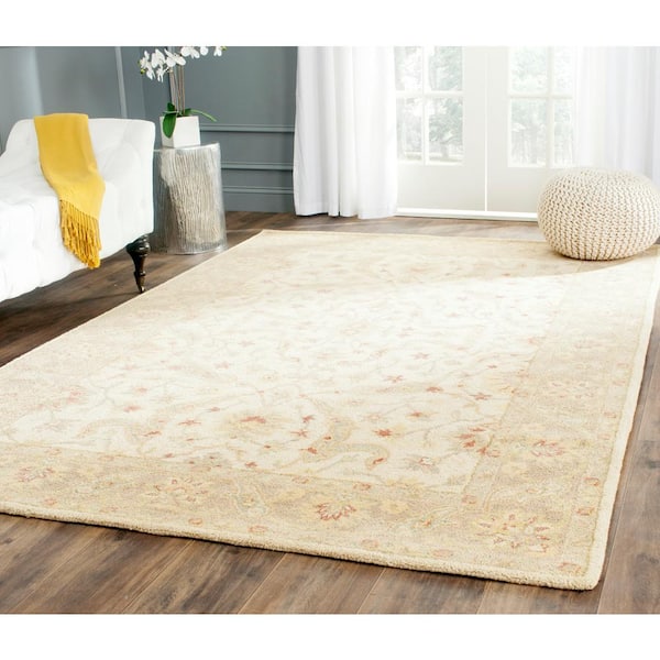Antiquity 10 ft. x 14 ft. Ivory/Brown Solid Area Rug