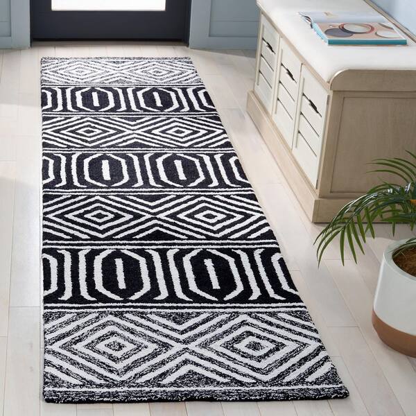 Capri 2 ft. x 9 ft. Ivory/Black Tribal CPR702Z Runner Rug