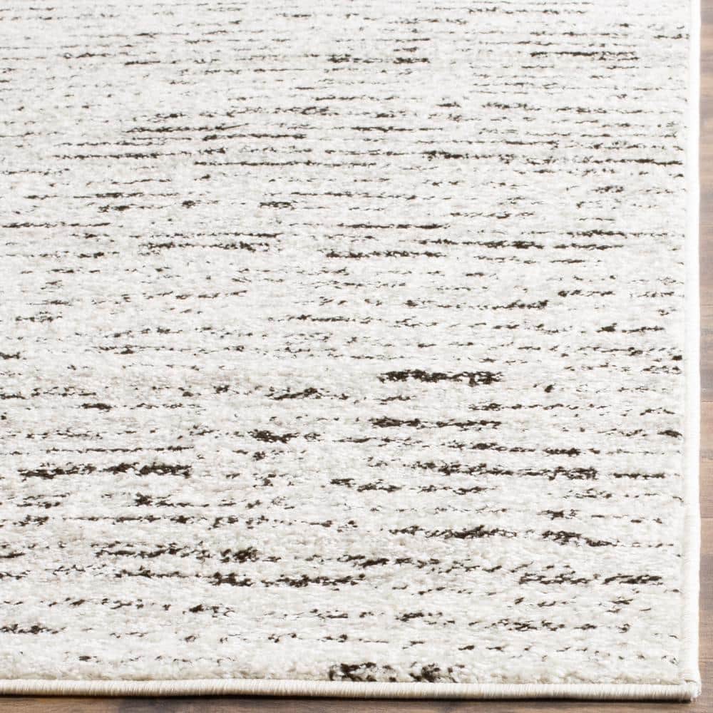 Ivory and Silver 8' x 10' Reversible Rectangular Area Rug