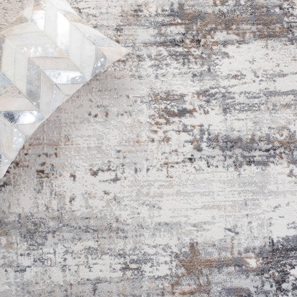 Ivory and Gray Abstract 8' x 10' Stain-Resistant Rug