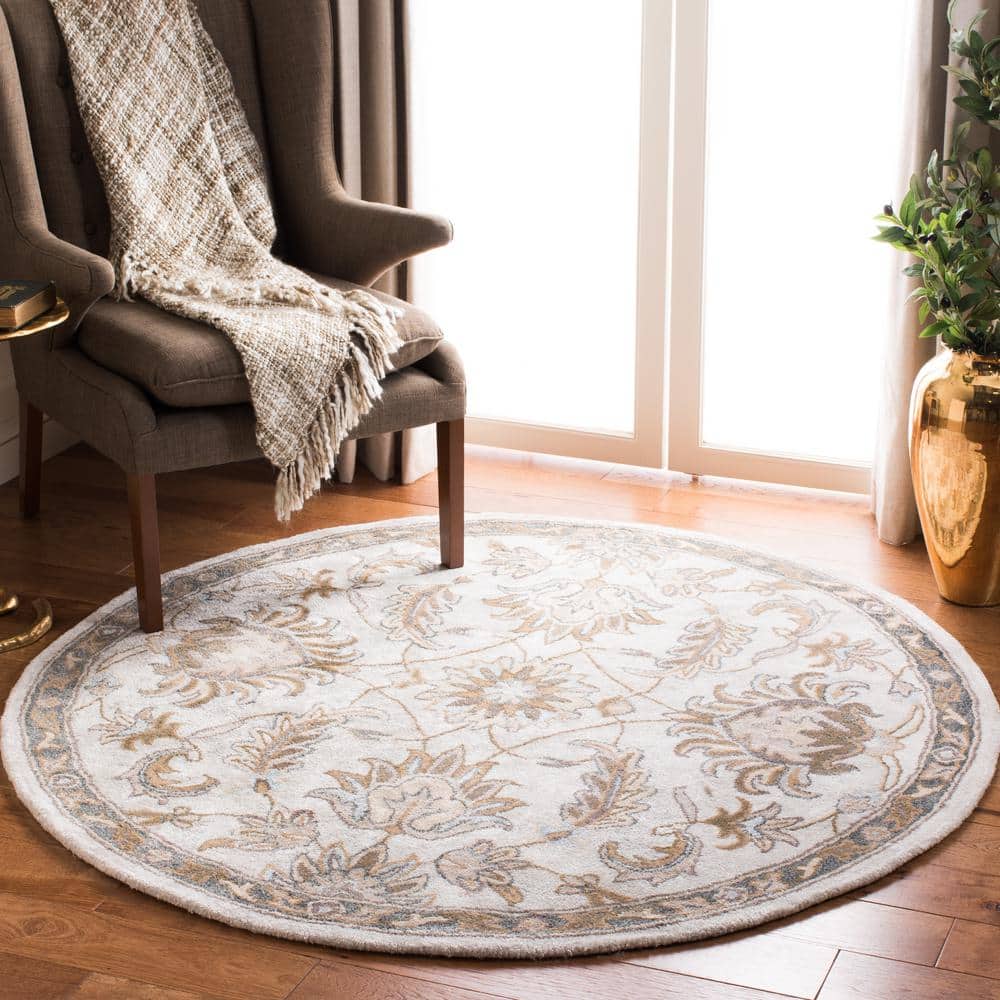 Handmade Ivory Floral Tufted Wool Round Rug, 5' x 5'