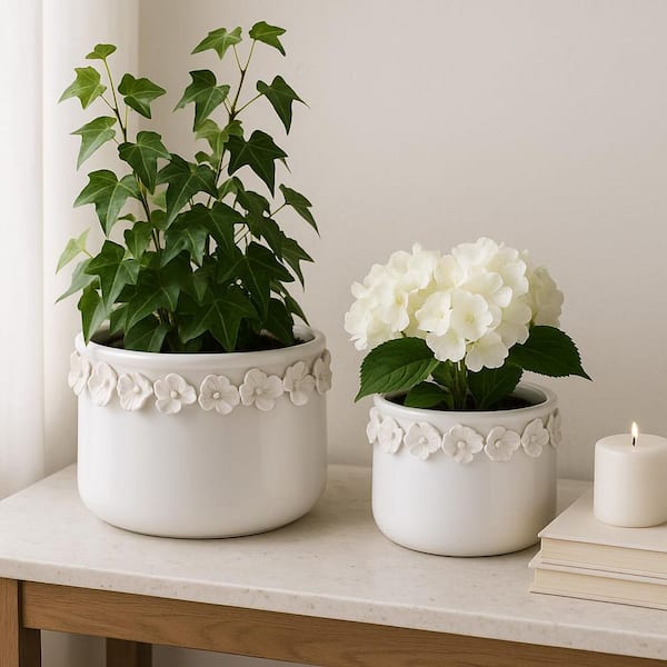 7 in. and 10 in. White Ceramic Floral Applique Decorative Pots (Set of 2)