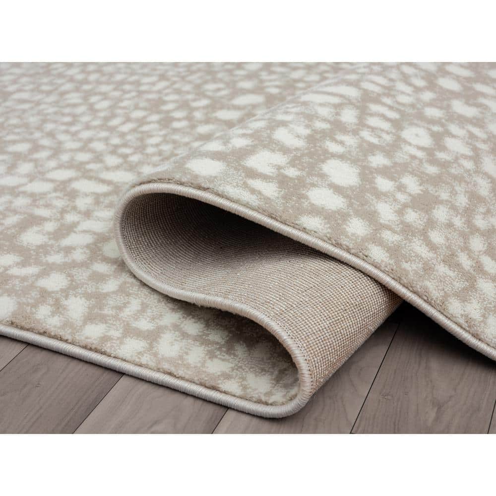 Ivory and Beige Cheetah Print 8' x 10' Synthetic Area Rug