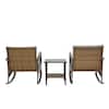 Three-piece metal patio conversation set with rattan rocking chairs and table.