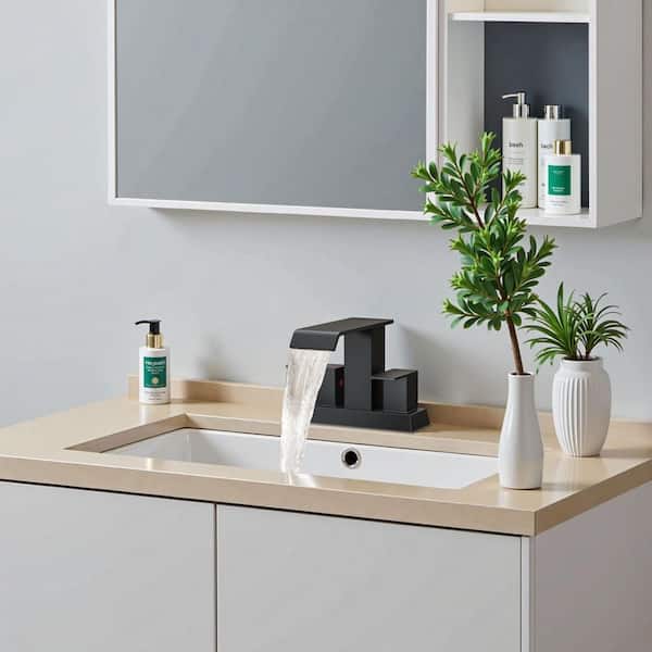 4 in. Centerset Double Handle Low Arc Bathroom Faucet with Pop-up Drain Included in Matte Black