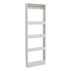 Front view of a tall white wooden shelving unit.