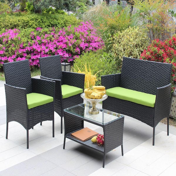 Gruisse 4-Piece Black Rattan Outdoor Sofa Set with Green Cushions and Tempered Glass Tea Table